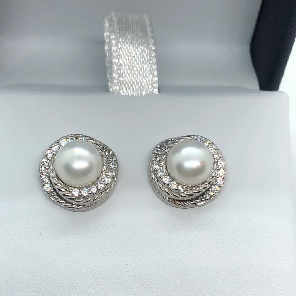 New Sterling Silver Pearl earrings.